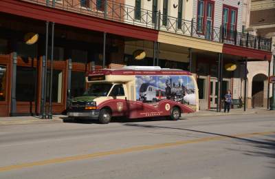 grapevine visitors shuttle parked on main street