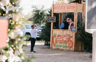 Christmas Capital of Texas mistletoe booth