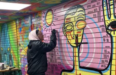 Street artist at work in Bangerz & Burgerz, Chichester