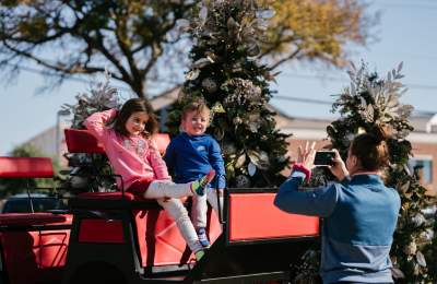 Christmas Capital of Texas kids in carriage
