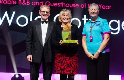 REYTA award winners receiving their trophy on stage