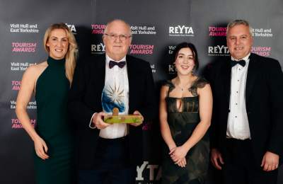 Little Wold Vineyard receiving a trophy at the REYTAs