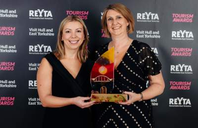 Staff from Doubltree by Hilton Hull with a winner's trophy