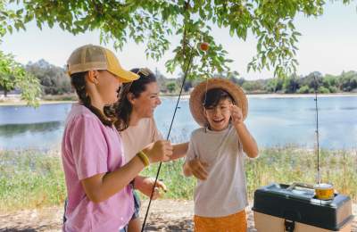 mother with children fishing at Atascadero Lake Park