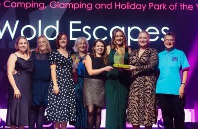 Wold Escapes on stage with their REYTA award