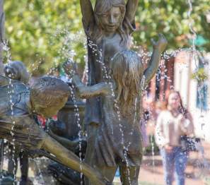 fountain made of children sculptures