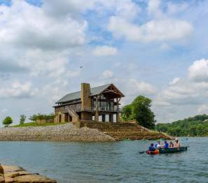 family kayaking on the Cumberland River