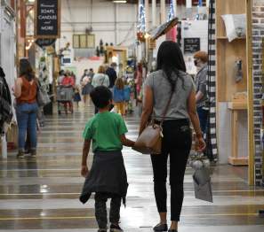family shopping in an indoor market