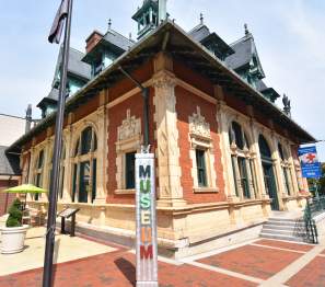 historic building with museum sign in front