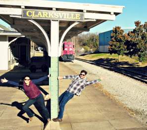 couple in front of a Clarksville train station