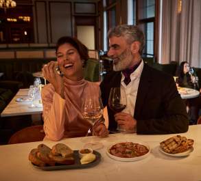 Couple sharing a meal in fine dining restaurant