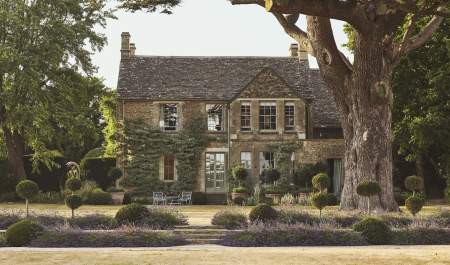 The Lodge at Thyme, a stunning Cotwold stone house surrounded by ancient trees