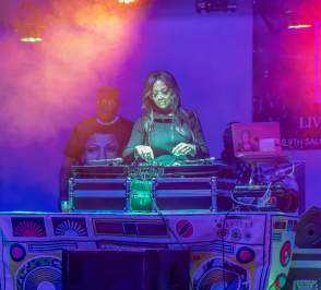 Female DJ performing at R&B and Me in Salina Kansas
