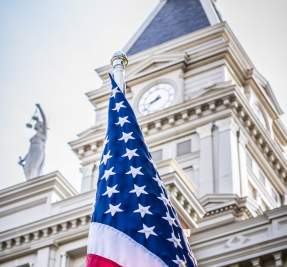 Historic County Courthouse spire with the American Flag