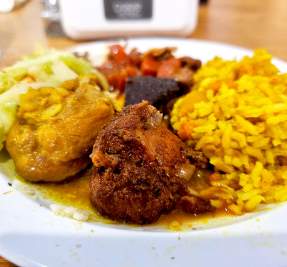 Plate of Caribbean food from JamRok Buffet