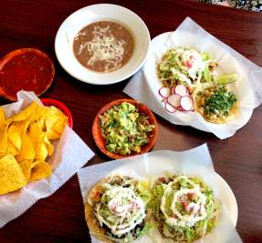 Tacos with chips and dip from Mi Lindo Veracruz