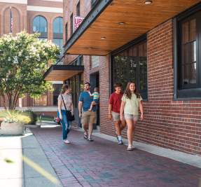 Family at Strawberry Alley Restaurant in downtown Clarksville