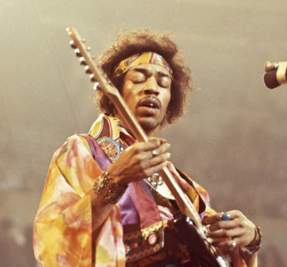 Jimi Hendrix playing guitar