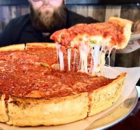 Cheesy deep-dish pizza from Camacho's