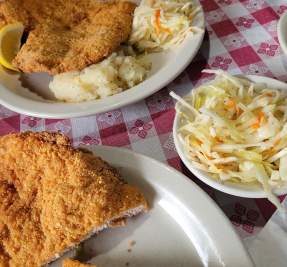 plates of schnitzel and German sides