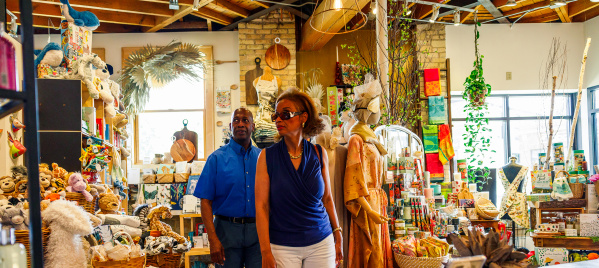 couple looking around store, shopping