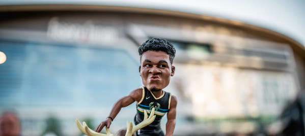 Giannis bobblehead in front of Fiserv Forum right before a game