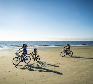 The hard packed sands on St. Simons Island's East Beach makes it perfect for riding bikes.