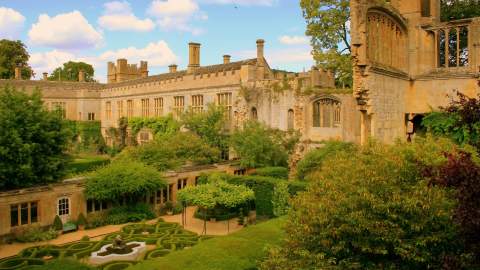 Sudeley Castle in the background, with it's ruins and gardens in front