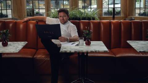 James Martin sitting at a table in Grill restaurant