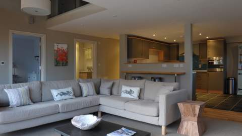 An open plan living room and kitchen at Notgrove Holidays