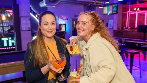 Girls Drinking in a bar - cocktails