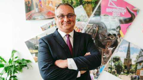 Neil Rami stood in front of images of the West Midlands