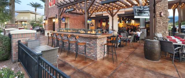 A large outdoor patio at a restaurant in Chandler, AZ