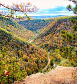 Landscape view looking out over a river gorge with fall foliage