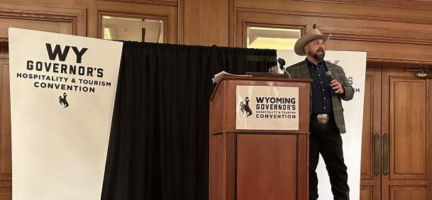 Wyoming Office of Tourism hosting a presentation to a crowd