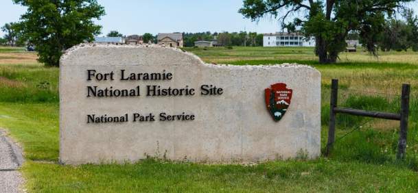 Historic structures at Fort Laramie National Historic Site surrounded by open grasslands in Goshen County, Wyoming.