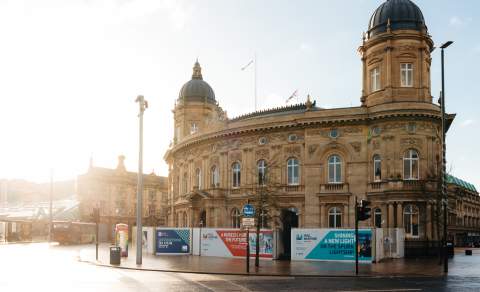 Hull Maritime Museum exterior with ornate historic architecture and colourful flower displays on a sunny day