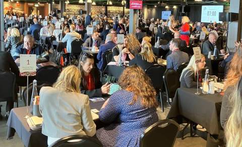 A member of the Cotswolds Tourism team talks to travel trade representatives at UK Inbound