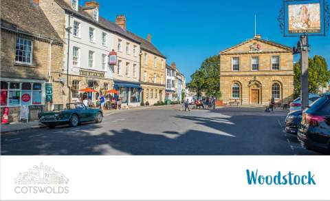The front cover of the Woodstock digital town guide