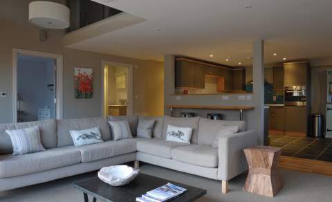 An open plan living room and kitchen at Notgrove Holidays