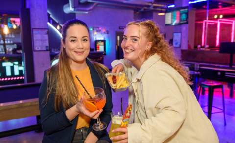 Girls Drinking in a bar - cocktails