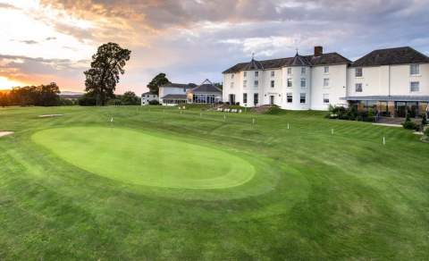 A golf green in front of Tewkesbury Park in the Cotswolds