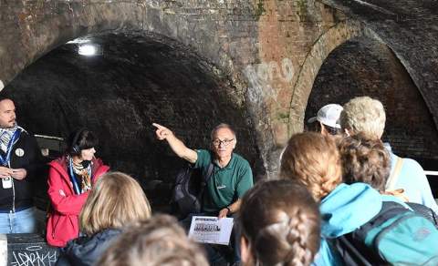 Group doing a walking tour of canals