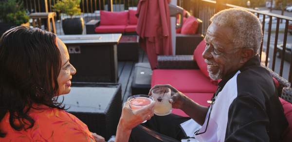 A couple at "Grace" rooftop bar in Downtown Mobile, AL.