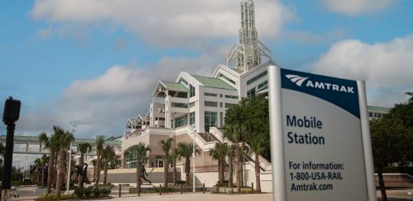 Photo of Amtrak Mobile Station sign outside of Arthur R. Outlaw Mobile Convention Center