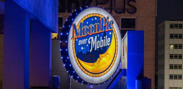 MoonPie Over Mobile electric MoonPie sits on the side of a building