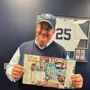 Brian Baumgartner (aka Kevin from The Office tv show) holding The Office Self-Guided Tour map