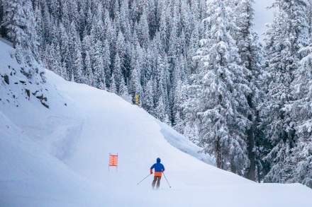 A skier descends down Brighton Resort’s Western Trail.
