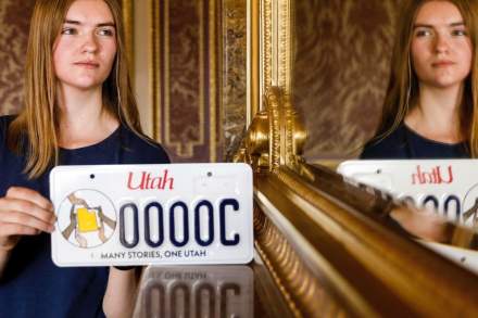 The design for the license plate was created by Eleanor Smith, a student from Timpview High School.