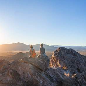 Two Hikers in Mountains